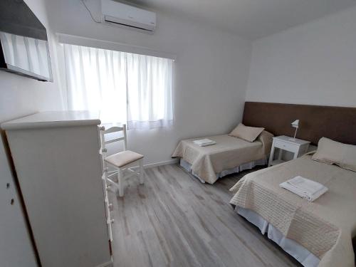 Letto o letti in una camera di Don Quijote Tandil