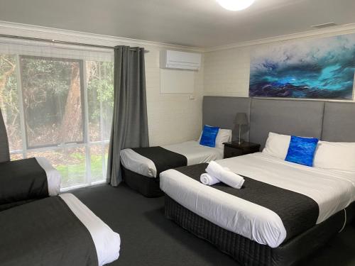 Cama o camas de una habitación en Frankston Motel