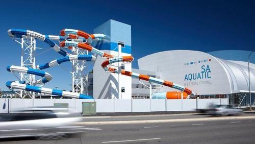 a large water amusement park with a roller coaster at Modern Share house, private bedroom with double size bed, 7min to beach in Oaklands