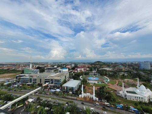 an overhead view of a city with buildings and traffic at Palam Mansion at Apartment One Residence in Batam Center