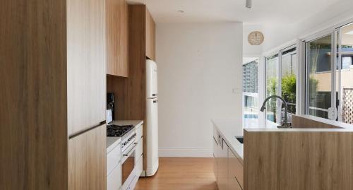 a kitchen with a sink and a counter top at The Willows in Wickham