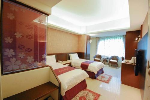 Cama o camas de una habitación en Cherry Feast Resort