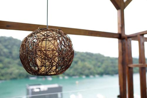 a ball of wire hanging from a ceiling at Cherry Feast Resort in Yuchi