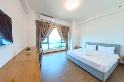 Katil atau katil-katil dalam bilik di Carnelian Tower - Sea View FC4215
