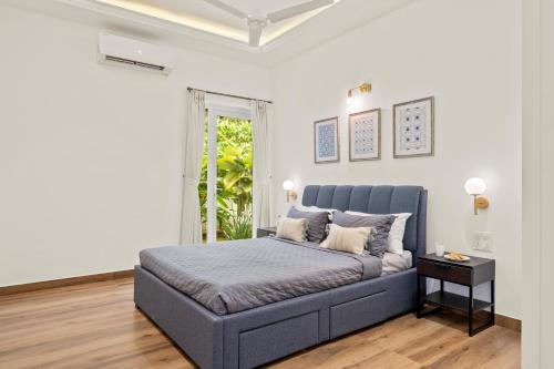 Postel nebo postele na pokoji v ubytování Casa Del Leon by Hireavilla -3BR w pool in Assagao