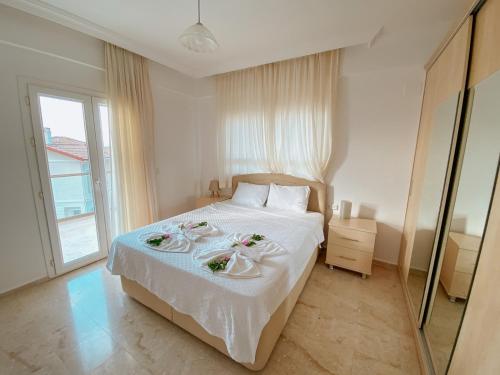 En eller flere senge i et værelse på Villa Beatrice Large family villa