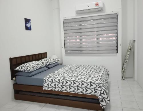 Katil atau katil-katil dalam bilik di Yussal Homestay