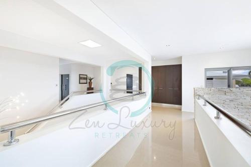 a view of the lobby of a luxury apartment at Zen Bayview Bliss: Luxury Marina Mansion in Stuart Park