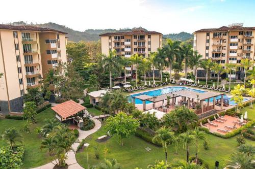 Bazén v ubytování Condo en Jacó nebo v jeho okolí