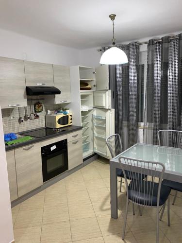 Кухня или кухненски бокс в Apartament