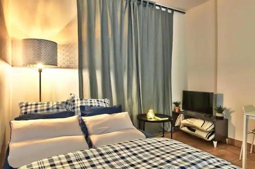 Ένα ή περισσότερα κρεβάτια σε δωμάτιο στο Appartement beau confort