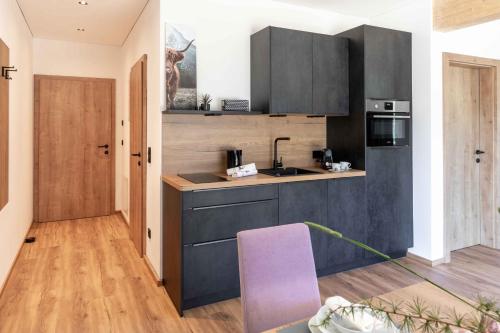 Kuchyň nebo kuchyňský kout v ubytování Feiserhof Navis - Appartements