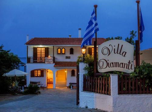a sign for a villa darmanti in front of a building at Villa Diamanti in Monemvasia
