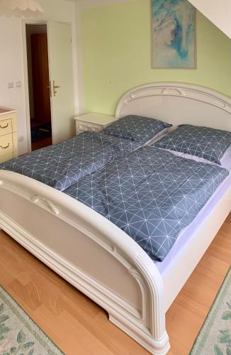 Katil atau katil-katil dalam bilik di Ferienwohnung Kranichnest