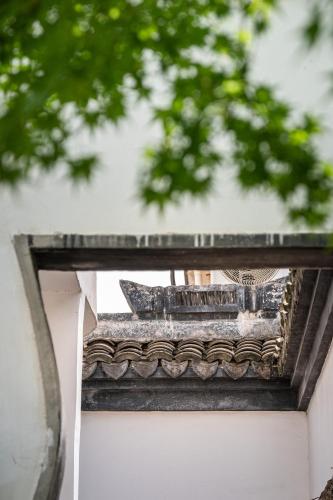 TongxiangにあるTingjian Musu Private Soup Design Homestay - South Gate of Wuzhen Xizha Scenic Areaのギャラリーの写真