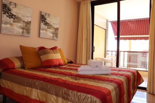 Postel nebo postele na pokoji v ubytování Estupendo apartamento