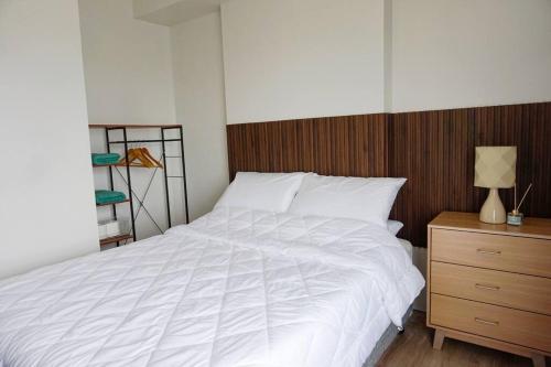 Een bed of bedden in een kamer bij Studio condo for rent