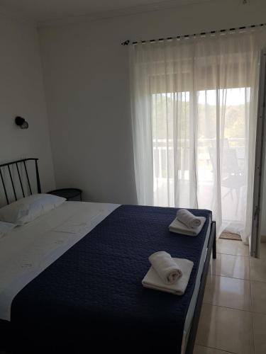 Postel nebo postele na pokoji v ubytování Apartments D&D