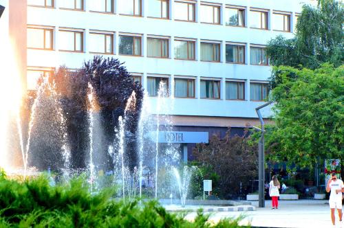 a water fountain in front of a building at Hemus Hotel - Vratza in Vratsa