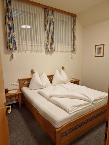 Ένα ή περισσότερα κρεβάτια σε δωμάτιο στο Ferienhaus Liss