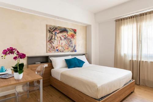Ένα ή περισσότερα κρεβάτια σε δωμάτιο στο I Due Mori Sicily Rooms