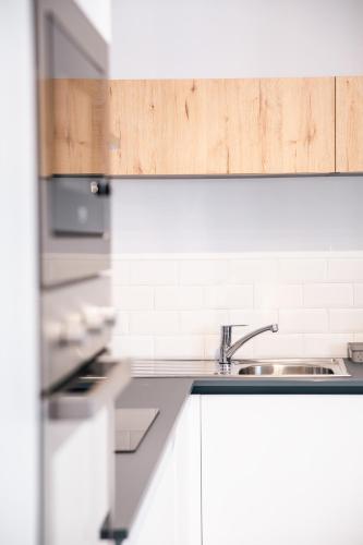 Η κουζίνα ή μικρή κουζίνα στο Sliema 2beds Backyard Flat by ArcoBnb