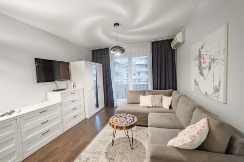 Svetainės erdvė apgyvendinimo įstaigoje Marilyn Comfort Apartment