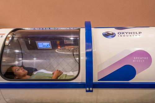 a young child in a train car at Vila Origens Boutique Hotel Albufeira – Adults Only in Albufeira