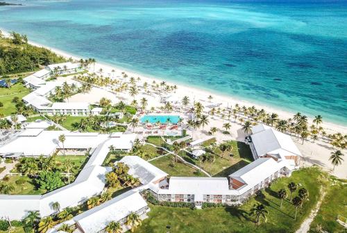 an aerial view of the resort and the beach at Viva Fortuna Beach by Wyndham, A Trademark All Inclusive in Freeport