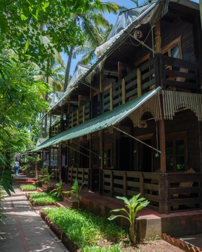 a building in the center of the resort at LOTUS feet BEACH RESORT Morjim in Morjim