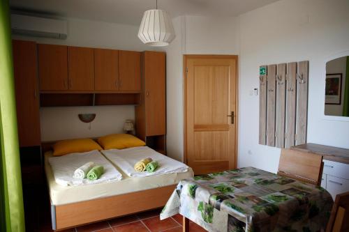 מיטה או מיטות בחדר ב-Apartements Magdalena