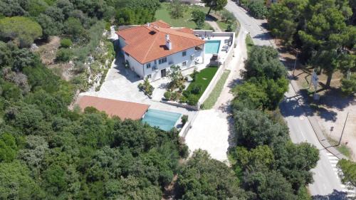an overhead view of a house with an orange roof at Villa Salteria 3, pool, private territory, pinery in Rovinj