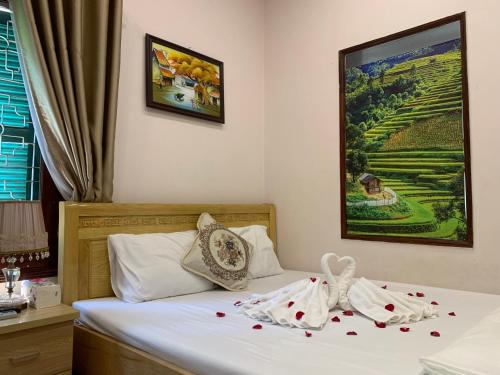 Katil atau katil-katil dalam bilik di Huong’s Family homestay