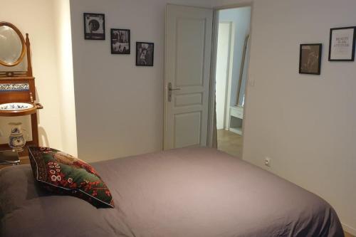 Katil atau katil-katil dalam bilik di Appartement 80m2 6 couchages