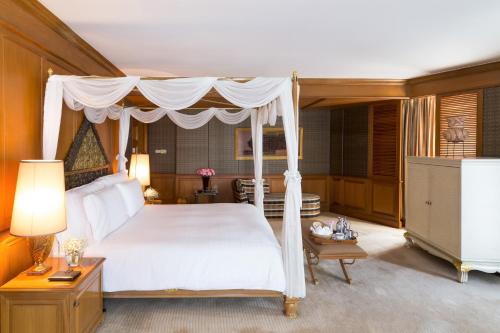 Postel nebo postele na pokoji v ubytování Pullman Khon Kaen Raja Orchid
