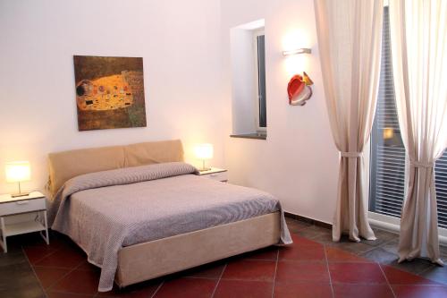 Postel nebo postele na pokoji v ubytování B&B Darsena