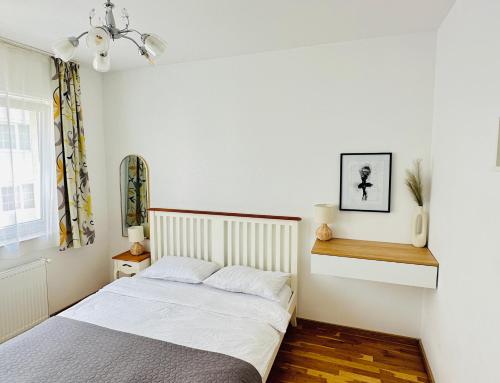 Voodi või voodid majutusasutuse Bel Dom - The Cosy, 2 bedrooms family apartment toas