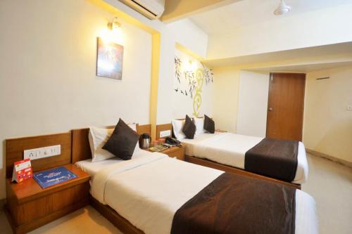 Postel nebo postele na pokoji v ubytování HOTEL CAMPUS