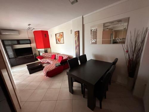Christos house-- Comfortable apartment with great view and private parking !