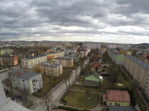 an aerial view of a city with buildings at Hotel SiLL in Kielce