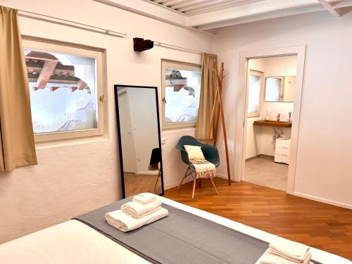 Postel nebo postele na pokoji v ubytování Streiter Rooms