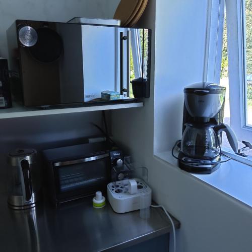 Kuchyň nebo kuchyňský kout v ubytování Bed & Breakfast Appartement 't Haventje