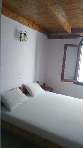 Spamandos Roomsにあるベッド