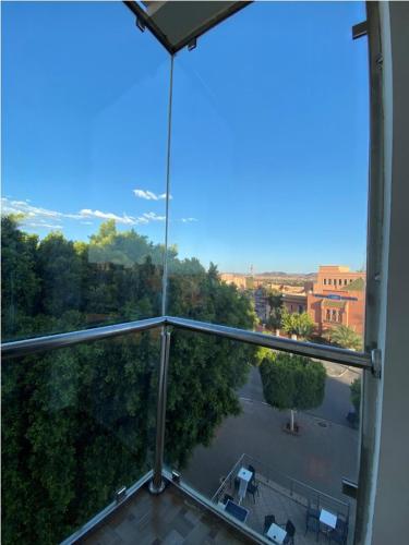 a view from a glass window of a building at Residence Imlil Ouarzazate in Ouarzazate