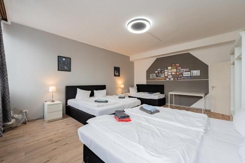 Postel nebo postele na pokoji v ubytování Modern Fancy Apartments Berlin City Center