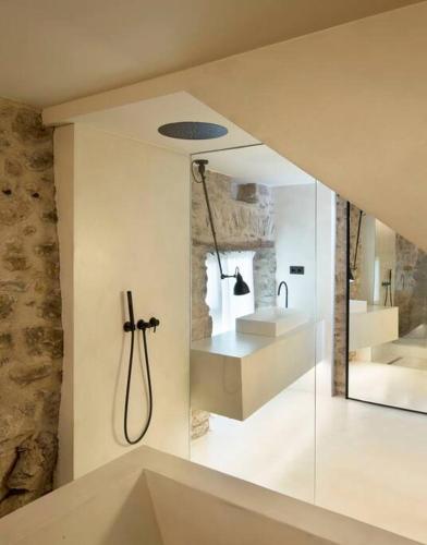 a bathroom with a shower and a sink at Cabana La Roca in La Roca