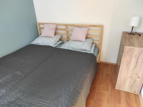 Ένα ή περισσότερα κρεβάτια σε δωμάτιο στο BudaWestHouse