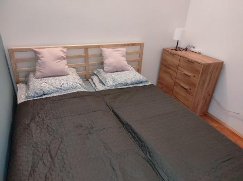 Ένα ή περισσότερα κρεβάτια σε δωμάτιο στο BudaWestHouse