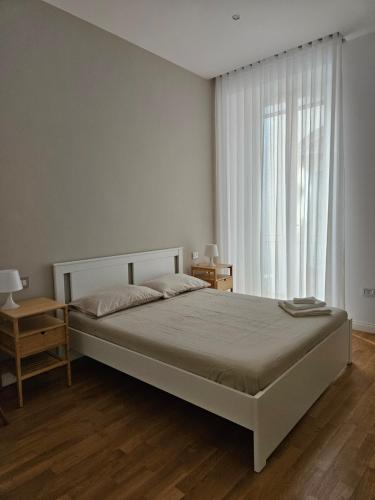 Posteľ alebo postele v izbe v ubytovaní Toledo Suites