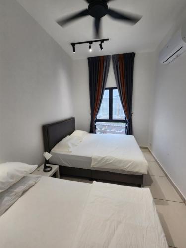 Una cama o camas en una habitación de The Horizon - Ipoh